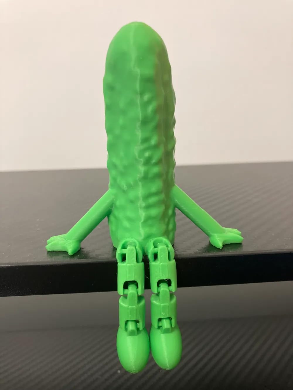Articulated Pickle Shelf Sitter