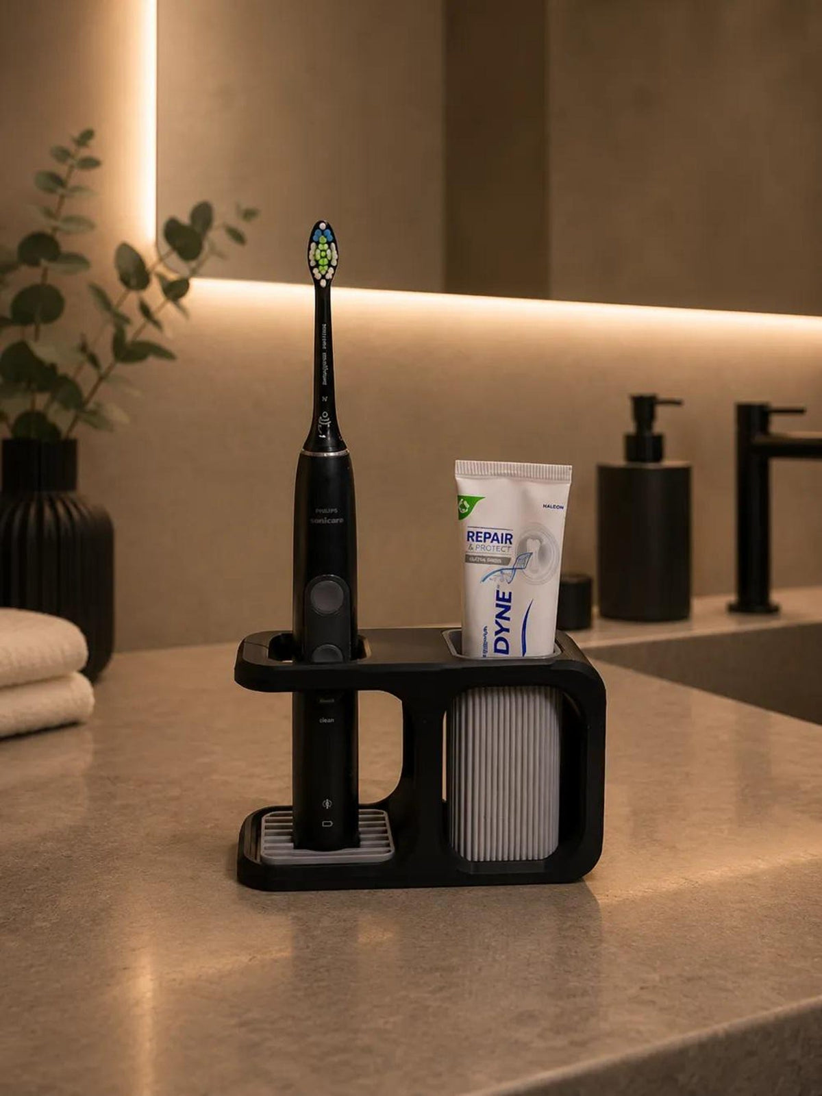 Double-width bathroom organizer in black and gray