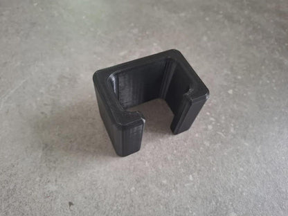 Rear seat buckle accessibility aid