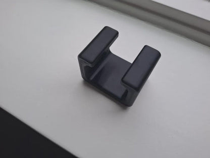 Upright seatbelt buckle support detail