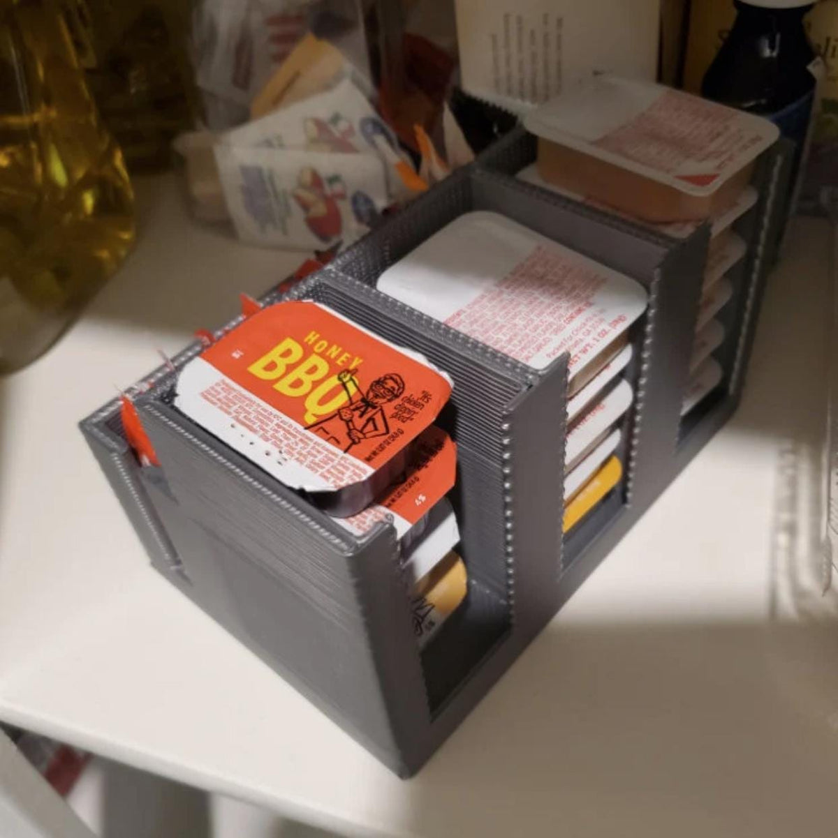 Three-compartment sauce packet organizer