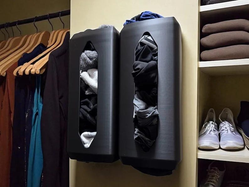 Wall-mounted sock and towel dispensers installed in a closet