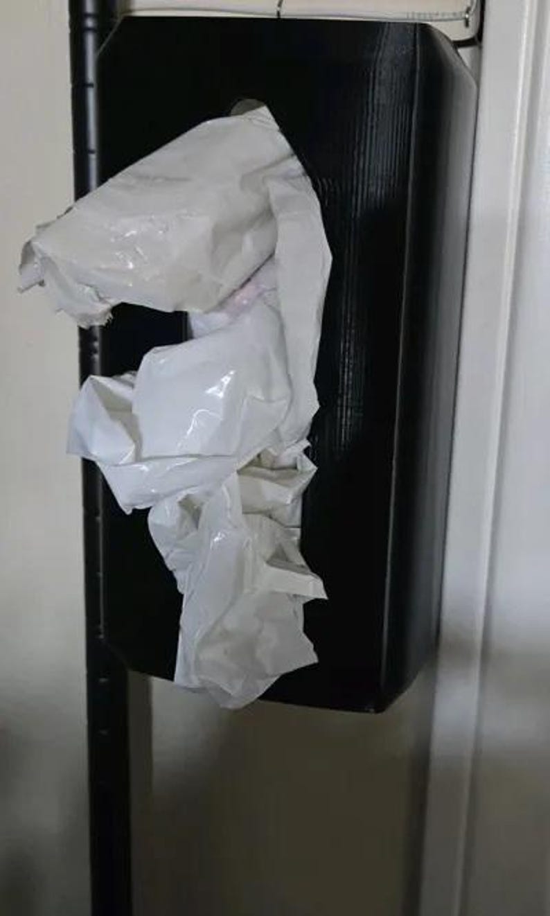 Wall-mounted sock and towel dispenser