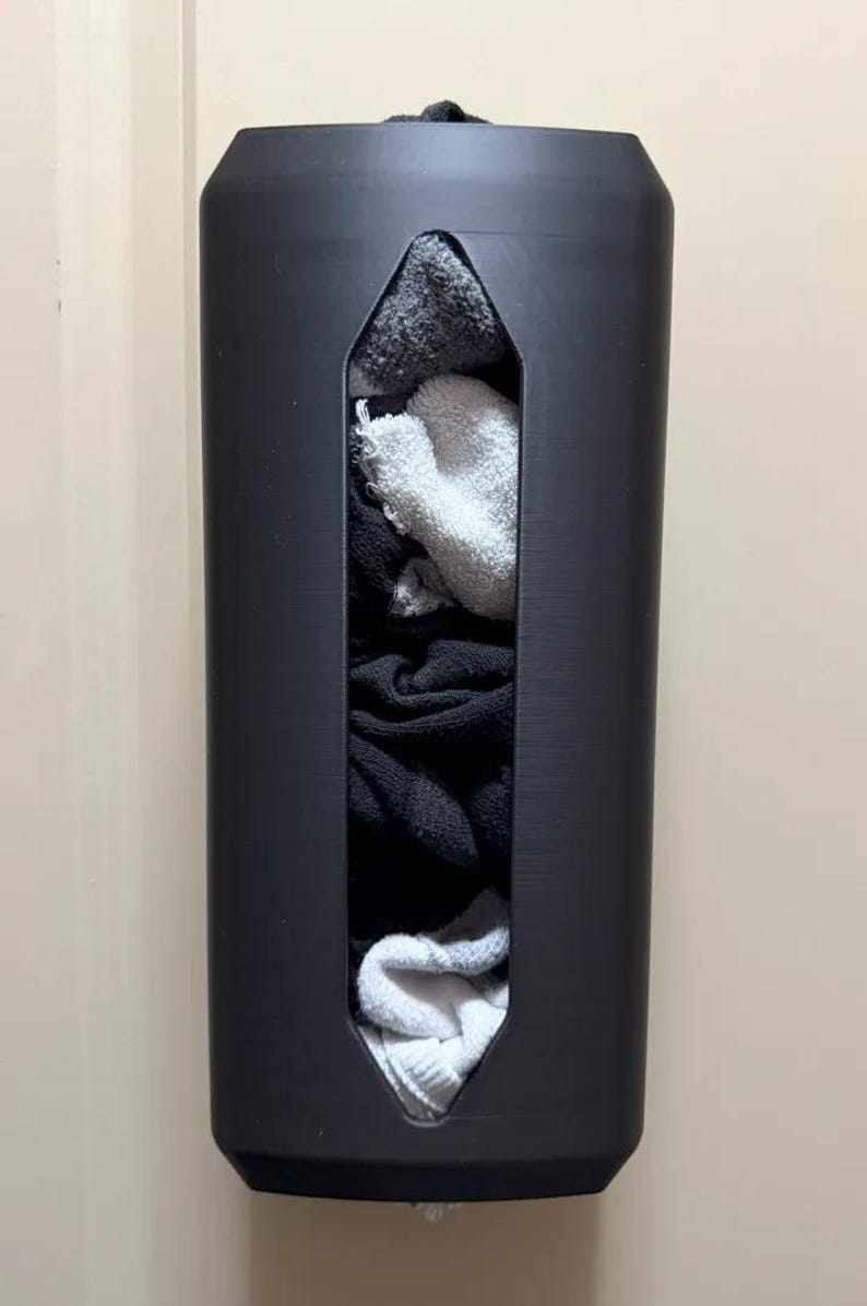 Wall-mounted sock and towel dispenser