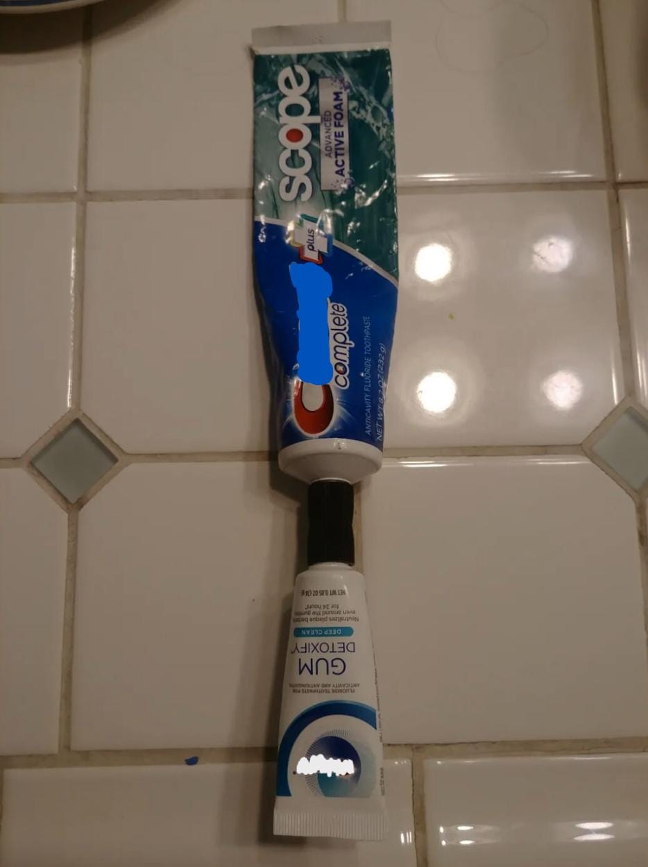 Toothpaste tubes connected for transferring contents