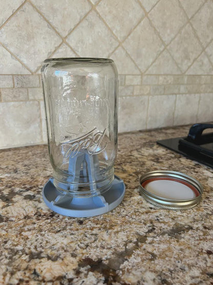 Mason jar drying upside down on the rack