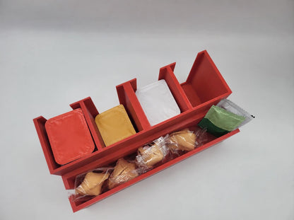Sauce cup and packet dispenser on a counter