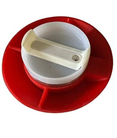 Four-compartment tumbler snack caddy filled with snacks